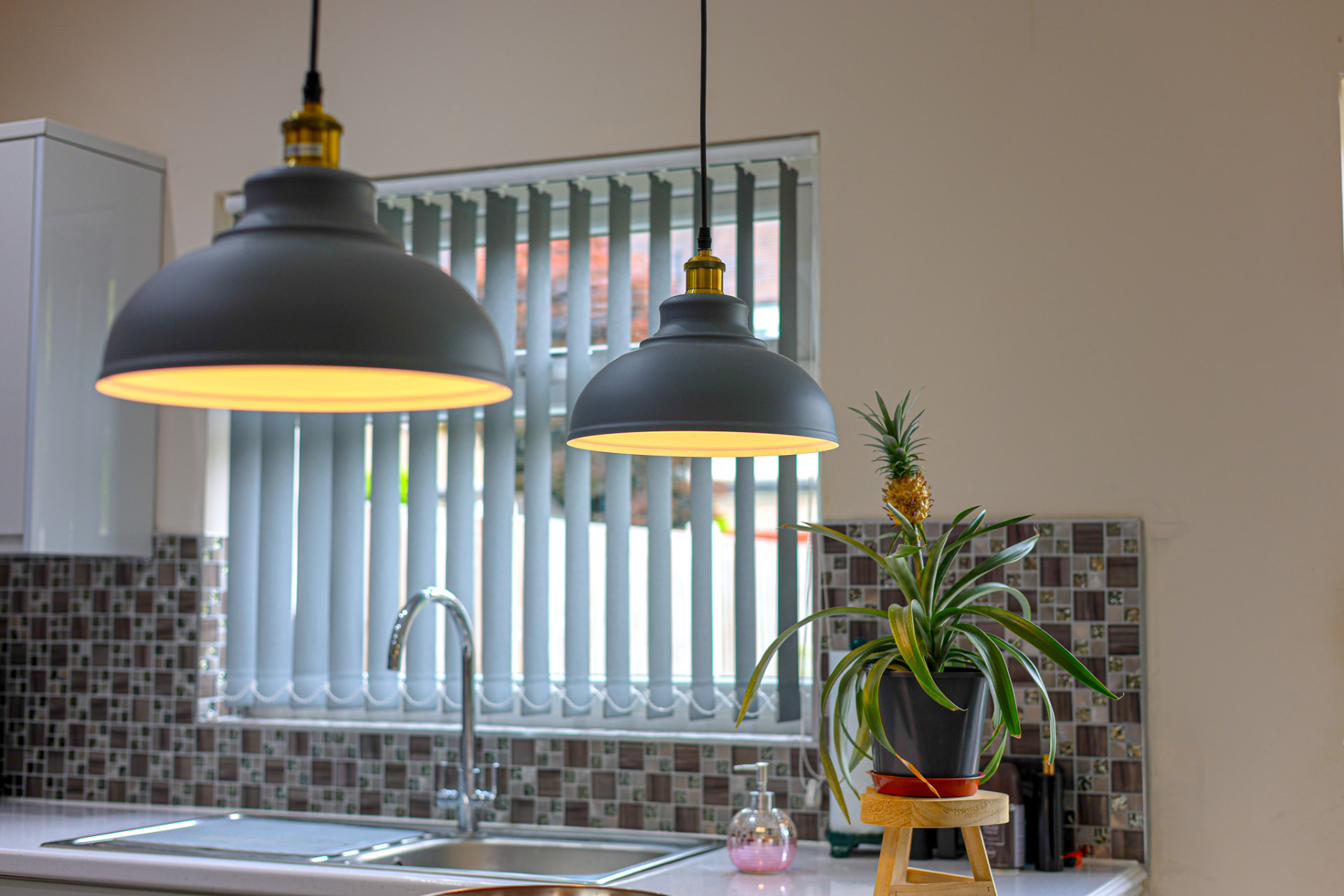 Kitchen pendant lighting detail photographed with balanced window light